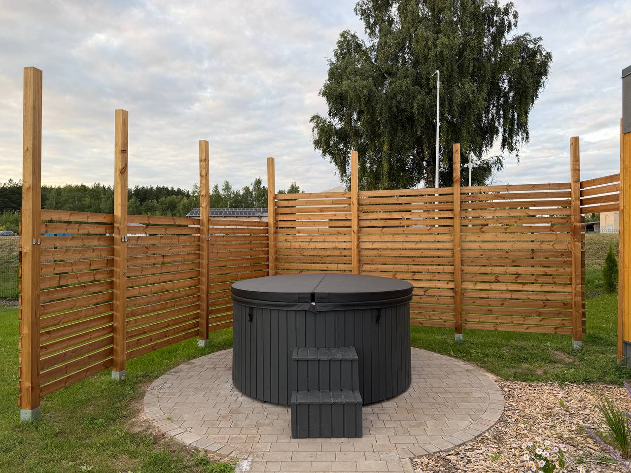 Private hot tub with wooden privacy screen — N58 Carnikava